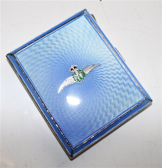 A 1930s engine turned silver and blue guilloche enamel rectangular cigarette case inset with R.A.F. winged emblem, gross 91 grams.
